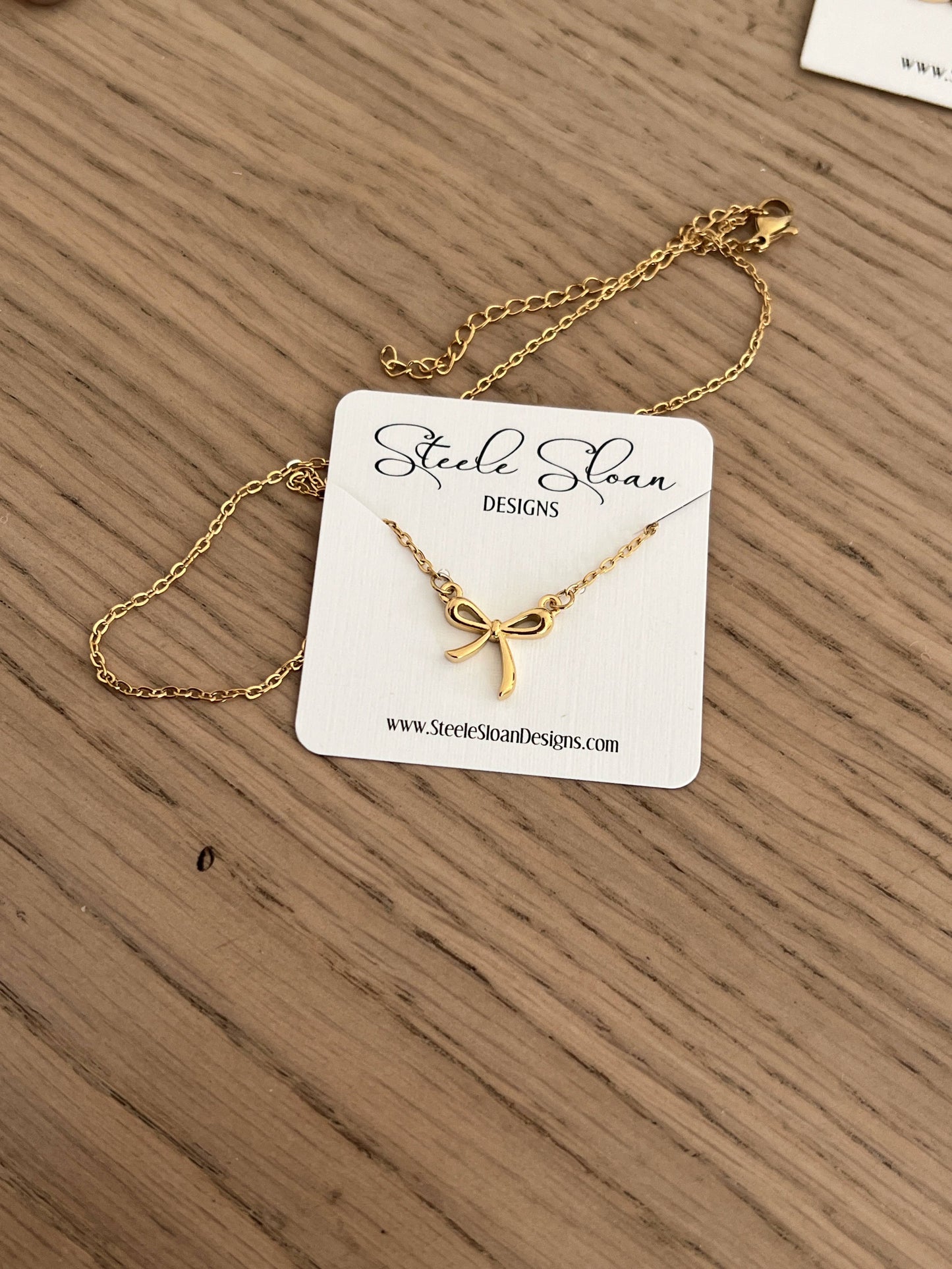 TRENDSETTER Gold Bow Necklace - Bows are In for Spring!